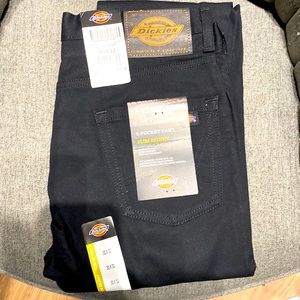 Dickies 30x32 SKINNY fit black pants. Brand new, all tags attached.